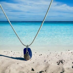 Real sea glass pendant, rare blue piece with sea shell charm